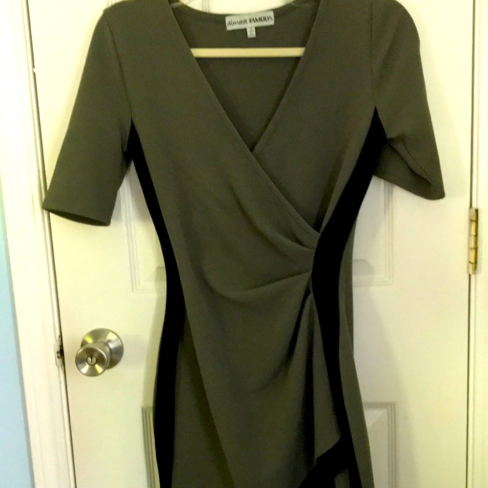 Green an black dress. Size small. Gathers on the side to accents the bottom.
